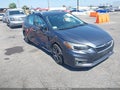 2017 Subaru Impreza — photo 1 of 17 | VIN 4S3GTAU61H3707709