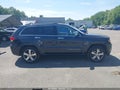 2014 Jeep Grand Cherokee — photo 13 of 16 | VIN 1C4RJFCT3EC190900