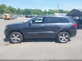 2014 Jeep Grand Cherokee — photo 14 of 16 | VIN 1C4RJFCT3EC190900