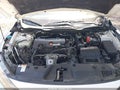 2018 Honda Civic — photo 10 of 16 | VIN 19XFC2F57JE004538