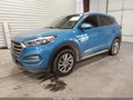 2018 Hyundai Tucson — photo 2 of 15 | VIN KM8J33A40JU704090