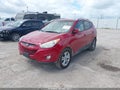 2013 Hyundai Tucson — photo 2 of 17 | VIN KM8JUCAC3DU575898