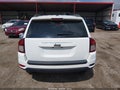 2016 Jeep Compass — photo 17 of 17 | VIN 1C4NJCBA0GD681435