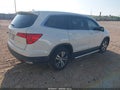 2018 Honda Pilot — photo 4 of 16 | VIN 5FNYF5H45JB026120