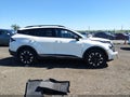 2023 Kia Sportage Hybrid — photo 13 of 16 | VIN KNDPYDAH4P7101949