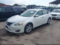 2014 Nissan Altima — photo 2 of 21 | VIN 1N4AL3AP0EC112950