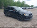 2016 Volkswagen Jetta — photo 1 of 12 | VIN 3VW167AJ1GM371885