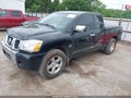 2004 Nissan Titan — photo 2 of 12 | VIN 1N6AA06A14N584321