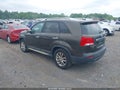 2011 Kia Sorento — photo 3 of 11 | VIN 5XYKU4A29BG175218