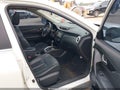 2015 Nissan Rogue — photo 5 of 17 | VIN 5N1AT2MV1FC914581