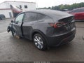 2024 Tesla Model Y — photo 3 of 16 | VIN 7SAYGDEEXRA220657