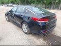 2017 Kia Optima — photo 3 of 12 | VIN 5XXGT4L34HG143580