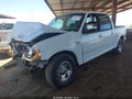 2002 Ford F-150 — photo 2 of 11 | VIN 1FTRW07652KC88816
