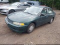 1999 Mitsubishi Mirage — photo 2 of 12 | VIN JA3AY26A1XU023331