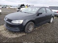 2014 Volkswagen Jetta — photo 2 of 12 | VIN 3VW2K7AJ6EM315079