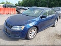 2014 Volkswagen Jetta — photo 2 of 12 | VIN 3VWD17AJ2EM362413
