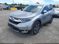 2018 Honda CR-V — photo 2 of 20 | VIN 7FARW1H52JE021337
