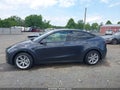 2024 Tesla Model Y — photo 13 of 17 | VIN 7SAYGDED6RF096669