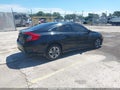 2018 Honda Civic — photo 4 of 18 | VIN 19XFC2F57JE011702