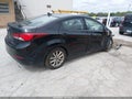 2014 Hyundai Elantra — photo 4 of 16 | VIN 5NPDH4AE9EH542087