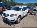 2012 Hyundai Santa Fe — photo 2 of 16 | VIN 5XYZGDAB4CG103771