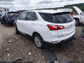 2018 Chevrolet Equinox — photo 3 of 17 | VIN 3GNAXJEV7JS563977
