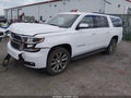 2019 Chevrolet Suburban — photo 2 of 17 | VIN 1GNSKHKC6KR313858