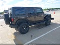 2013 Jeep Wrangler Unlimited — photo 4 of 16 | VIN 1C4BJWDG2DL671402