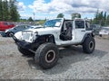 2016 Jeep Wrangler Unlimited — photo 2 of 15 | VIN 1C4HJWDG7GL185800