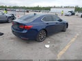 2015 Acura TLX — photo 4 of 16 | VIN 19UUB2F79FA007707