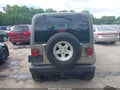 2004 Jeep Wrangler — photo 16 of 18 | VIN 1J4FA59S04P746920