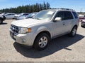 2009 Ford Escape — photo 2 of 16 | VIN 1FMCU94G39KD11626