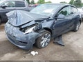 2023 Tesla Model Y — photo 2 of 15 | VIN 7SAYGDEE8PA156499