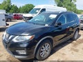 2017 Nissan Rogue — photo 14 of 17 | VIN JN8AT2MT0HW405879