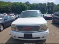2004 GMC Yukon XL — photo 6 of 11 | VIN 1GKFK66U54J317911