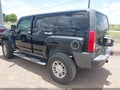 2009 Hummer H3 — photo 3 of 17 | VIN 5GTEN13E198118635