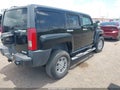 2009 Hummer H3 — photo 4 of 17 | VIN 5GTEN13E198118635