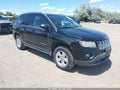 2014 Jeep Compass — photo 1 of 17 | VIN 1C4NJCBA7ED881984