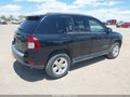 2014 Jeep Compass — photo 4 of 17 | VIN 1C4NJCBA7ED881984
