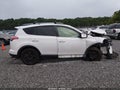 2018 Toyota RAV4 — photo 13 of 16 | VIN JTMZFREV9JJ179200