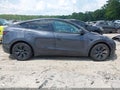 2024 Tesla Model Y — photo 13 of 18 | VIN 7SAYGDEE8RA310308