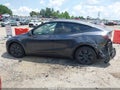 2024 Tesla Model Y — photo 14 of 18 | VIN 7SAYGDEE8RA310308