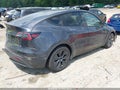 2024 Tesla Model Y — photo 4 of 18 | VIN 7SAYGDEE8RA310308
