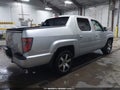 2014 Honda Ridgeline — photo 4 of 17 | VIN 5FPYK1F68EB007888