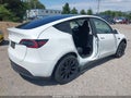 2023 Tesla Model Y — photo 4 of 18 | VIN 7SAYGDED7PF956382