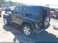 2019 Jeep Wrangler — photo 3 of 16 | VIN 1C4GJXAN4KW506297