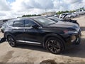 2020 Hyundai Santa Fe — photo 14 of 17 | VIN 5NMS33AAXLH144412