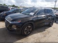 2020 Hyundai Santa Fe — photo 2 of 17 | VIN 5NMS33AAXLH144412