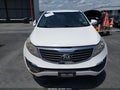 2013 Kia Sportage — photo 12 of 16 | VIN KNDPBCA29D7538946
