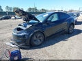 2026 Tesla Model Y — photo 2 of 18 | VIN 7SAYGDED6TA583102
